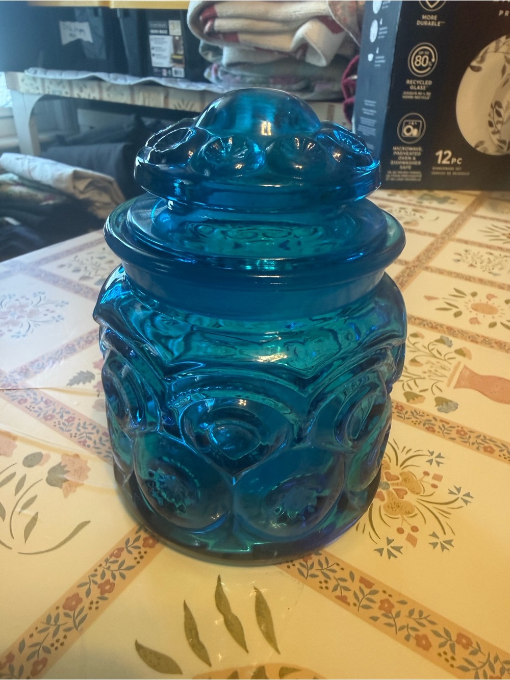 vintage blue glass "Moon and Stars" pattern canister jar.